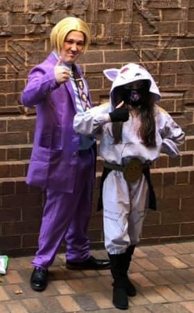 My husband as Yoshikage Kira and our daughter as Killer Queen in her custom Kigu I made. 2021.